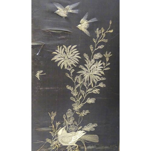 340 - A Japanese four-fold screen, with silkwork panels depicting birds and butterflies amongst foliage, t... 