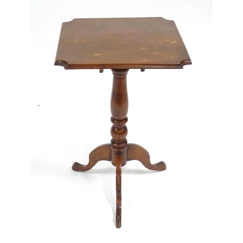 342 - An early 20thC oak tilt-top occasional table, the squared top with chamfered edges and scalloped cor... 