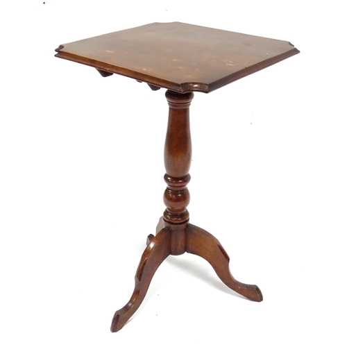 342 - An early 20thC oak tilt-top occasional table, the squared top with chamfered edges and scalloped cor... 