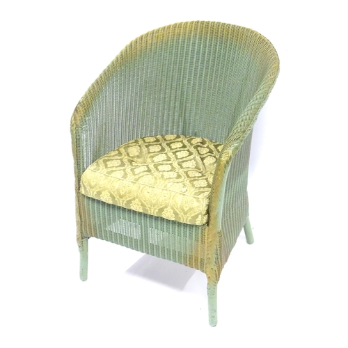 346 - A mid 20thC Lloyd Loom Lusty armchair, approx 29