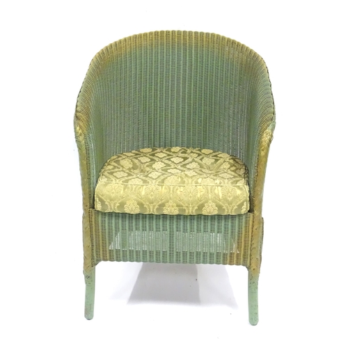 346 - A mid 20thC Lloyd Loom Lusty armchair, approx 29