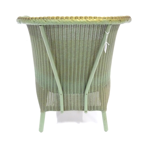 346 - A mid 20thC Lloyd Loom Lusty armchair, approx 29