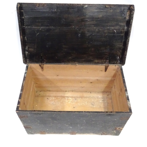 350 - An early 20thC painted pine trunk / chest / blanket box , with bracket reinforcements and loop handl... 