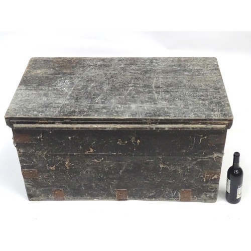 350 - An early 20thC painted pine trunk / chest / blanket box , with bracket reinforcements and loop handl... 