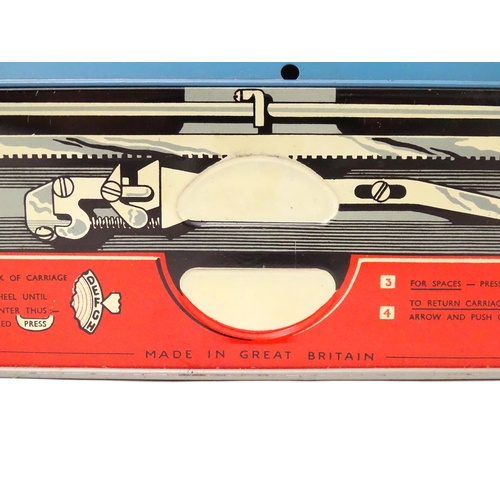 357 - Toy: A Mettoy Junior tinplate toy typewriter with original box.