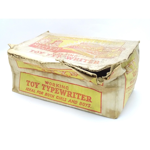 357 - Toy: A Mettoy Junior tinplate toy typewriter with original box.