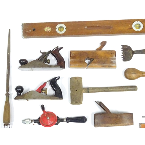 381 - A quantity of carpentry / woodworking tools , including jack planes, saws, hammer, a rebate plane by... 