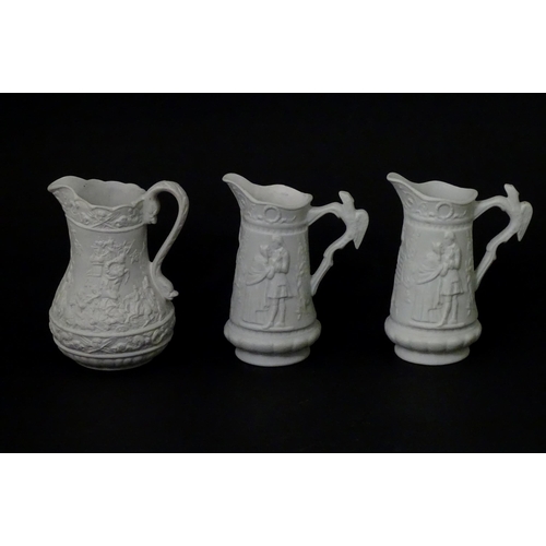 459 - Three Portmeirion Parian ware jugs with relief detail. Largest approx. 4 1/2