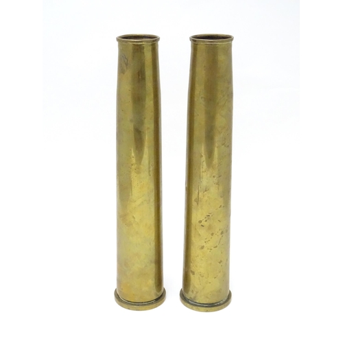 461 - Two brass 40mm Bofors cannon shell cases, each bearing Ministry of Defence forward arrow marks and d... 