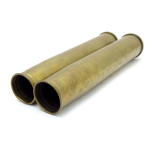 461 - Two brass 40mm Bofors cannon shell cases, each bearing Ministry of Defence forward arrow marks and d... 