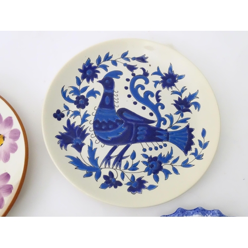 361 - A quantity of plates to include a Wedgwood limited edition plate in the Tulip pattern designed by Cl... 