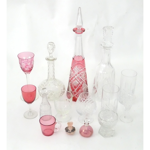 383 - A quantity of assorted glassware to include decanters, cranberry glasses, 19thC table salt, small sc... 