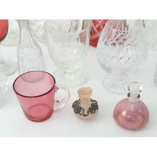 383 - A quantity of assorted glassware to include decanters, cranberry glasses, 19thC table salt, small sc... 