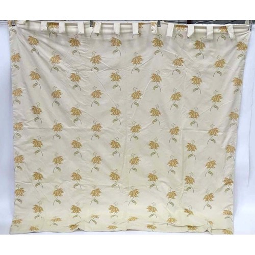 1090 - A pair of tab top curtains decorated with floral motifs, each approx 84