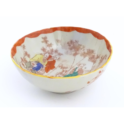 74 - Three assorted Chinese items to include a Cantonese famille rose plate decorated with figures, flowe... 
