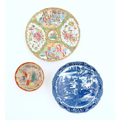 74 - Three assorted Chinese items to include a Cantonese famille rose plate decorated with figures, flowe... 