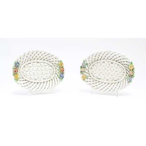 76 - A pair of 19thC cream dishes of basket weave form with applied floral and foliate detail. Approx. 10... 
