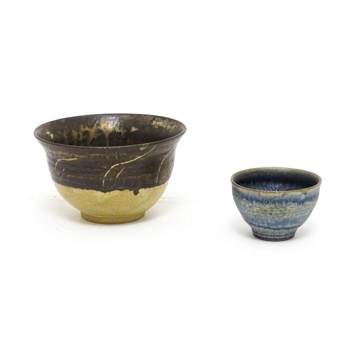 143 - A studio pottery two tone bowl with drip detail. Together with a small studio pottery bowl with a mo... 