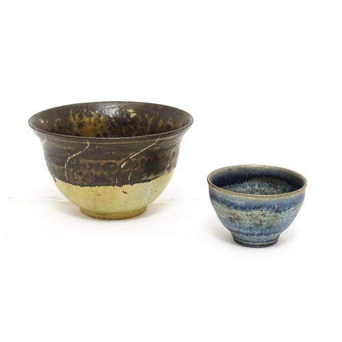 143 - A studio pottery two tone bowl with drip detail. Together with a small studio pottery bowl with a mo... 