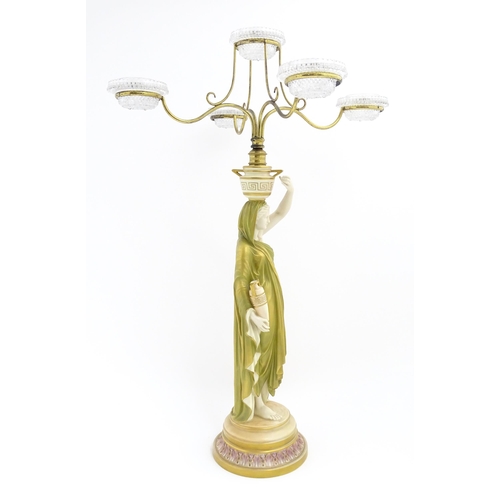 182 - A Royal Worcester five branch Cricklite candle holder modelled as a Grecian Water Carrier. With five... 