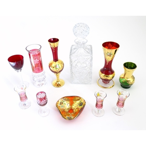 323 - A quantity of assorted glassware to include a cut crystal decanter together with various items of bo... 