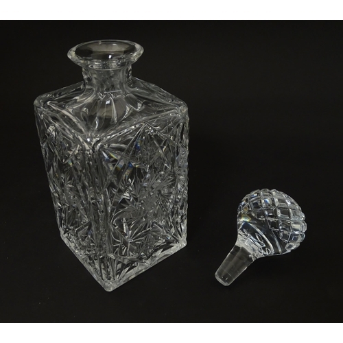 323 - A quantity of assorted glassware to include a cut crystal decanter together with various items of bo... 