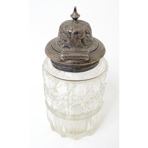 595 - A Victorian cut glass cruet bottle with a silver lid hallmarked 1893. Together with an associated wh... 