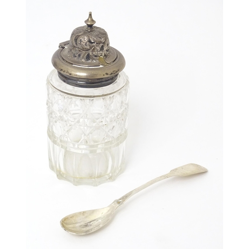 595 - A Victorian cut glass cruet bottle with a silver lid hallmarked 1893. Together with an associated wh... 