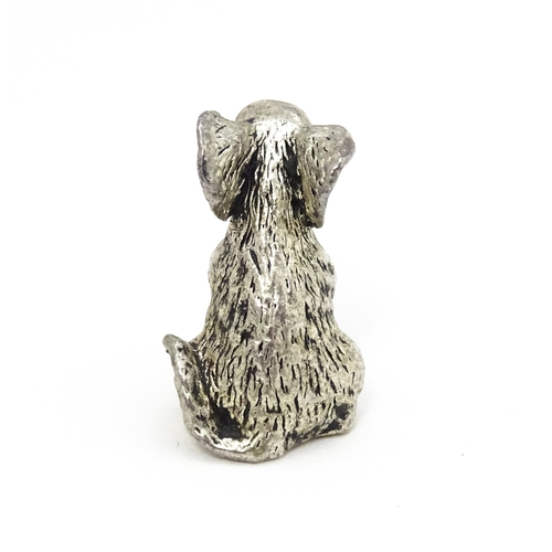 608 - A silver plate model of a seated mouse. Approx. 1