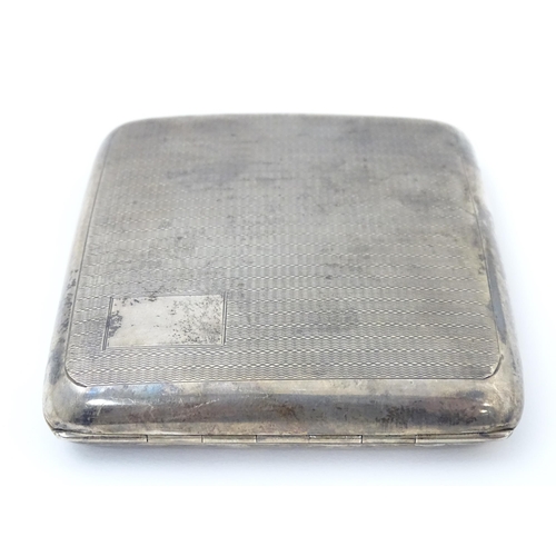 337 - An Art Deco silver cigarette case with engine turned decoration. Hallmarked Birmingham 1937 maker Fr... 