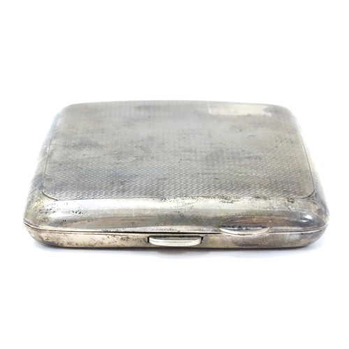 337 - An Art Deco silver cigarette case with engine turned decoration. Hallmarked Birmingham 1937 maker Fr... 