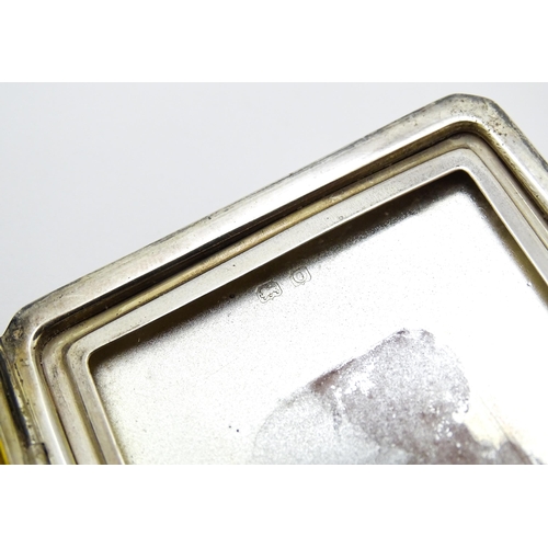 340 - An Art Deco silver compact of rectangular form with engine turned decoration hallmarked Birmingham 1... 