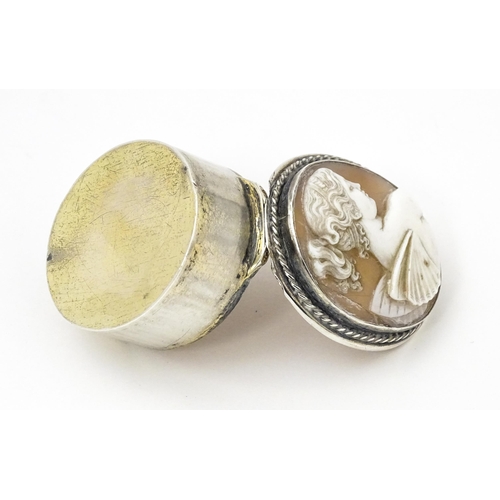 347 - A silver pill box with shell carved cameo to lid depicting a fairy, hallmarked Chester 1904, maker C... 