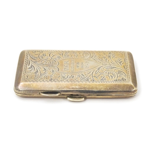 348 - A silver cigarette case with acanthus decoration and engraved 'D. K. M. Oronsay ...', opening to rev... 