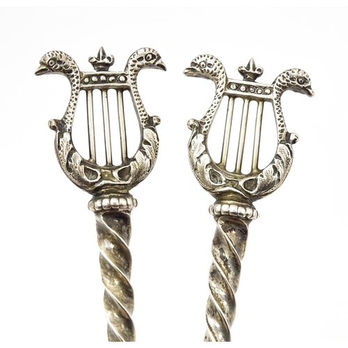 349 - A pair of Victorian silver serving spoons with twist handles and lyre finials, hallmarked London 189... 