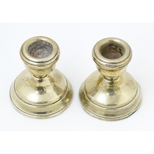 366 - A pair of squat silver candlesticks hallmarked Birmingham 1978, maker W. I. Broadway & Co. Approx. 2... 