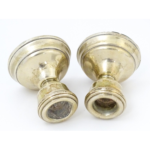 366 - A pair of squat silver candlesticks hallmarked Birmingham 1978, maker W. I. Broadway & Co. Approx. 2... 