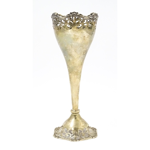 367 - A silver bud vase with openwork decoration hallmarked London 1911, maker Josiah Williams & Co. Appro... 