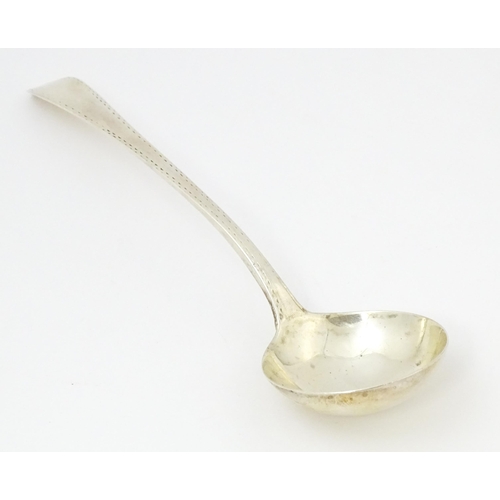 368 - A Geo III silver sauce ladle with bright cut decoration hallmarked London c. 1778, maker Stephen Ada... 