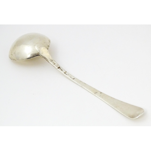 368 - A Geo III silver sauce ladle with bright cut decoration hallmarked London c. 1778, maker Stephen Ada... 