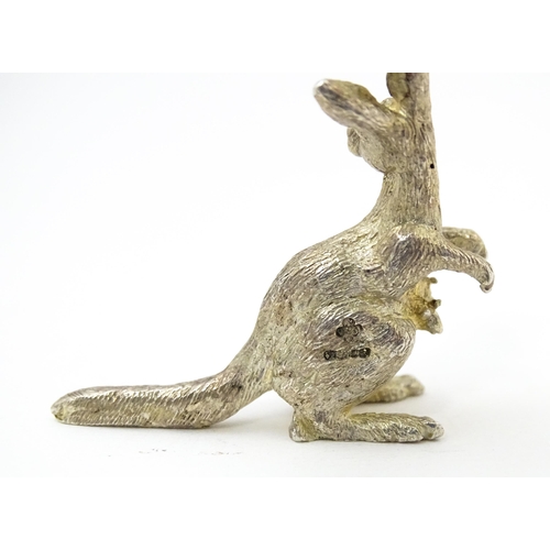 377 - A silver model of a kangaroo and joeys, hallmarked London 2001. Approx. 1 1/2