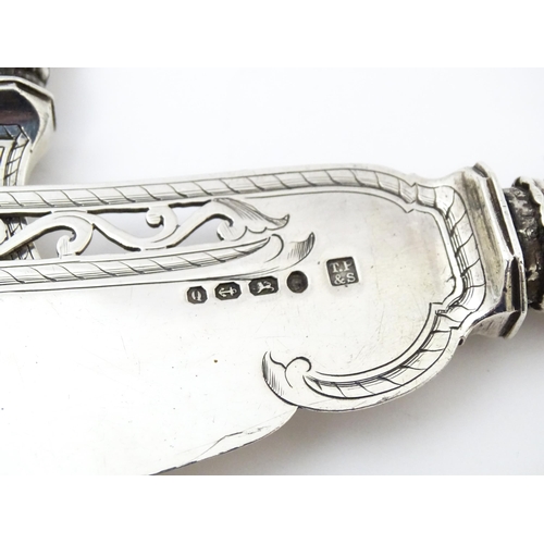 390 - A pair of Victorian silver fish servers hallmarked Birmingham 1865, maker Thomas Prime & Son. Larges... 