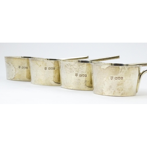 394 - A set of four silver brandy /spirit warming saucepans, hallmarked London 1904, maker Josiah Williams... 