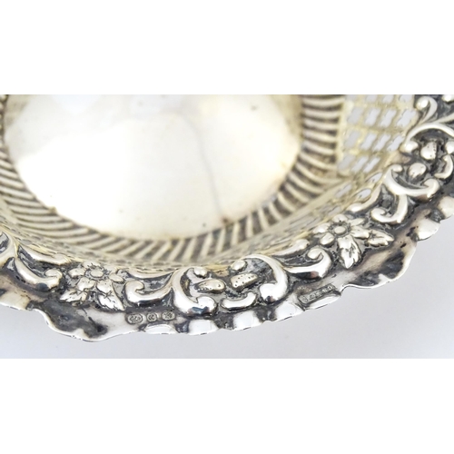 403 - A Victorian silver bon bon dish with embossed and pierced decoration, hallmarked Birmingham 1897, ma... 