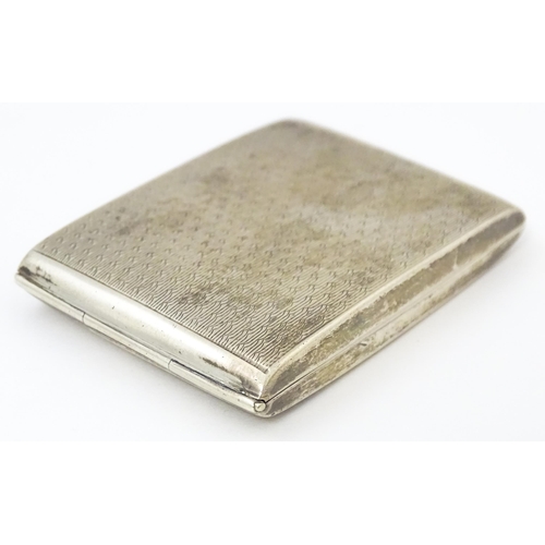 411 - A silver match box case / sleeve with engine turned decoration hallmarked Chester 1929, maker E. J. ... 