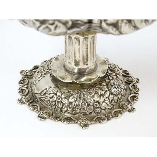 440 - A Victorian comport / tazza with embossed floral decoration, hallmarked London 1886, maker William C... 