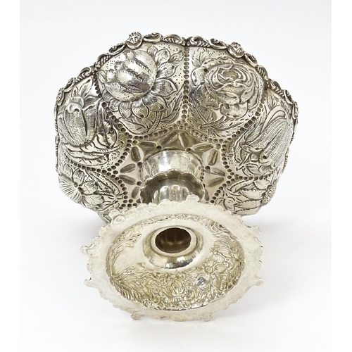 440 - A Victorian comport / tazza with embossed floral decoration, hallmarked London 1886, maker William C... 