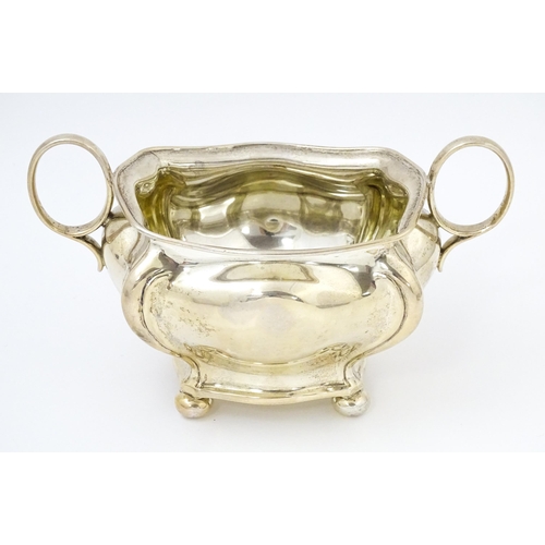 443 - A silver twin handled sugar bowl hallmarked Sheffield 1908, maker Joseph Rogers & Sons. Approx. 4 1/... 