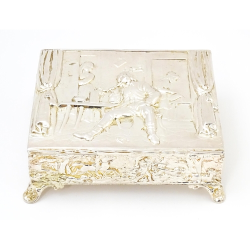 444 - A silver box with embossed tavern scene to lid and hunting scene to sides, opening to reveal a gilde... 