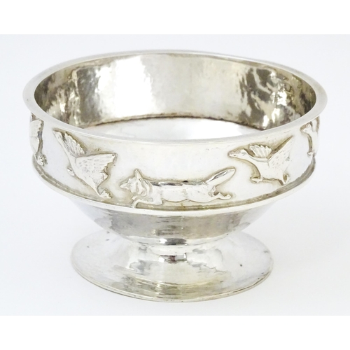 446 - Albert Edward Jones : An Arts & Crafts silver hammered pedestal bowl with banded relief decoration d... 